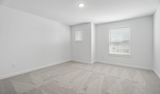 902 Hooks Trl, League City, TX 77573 - empty room featuring light colored carpet and recessed lighting