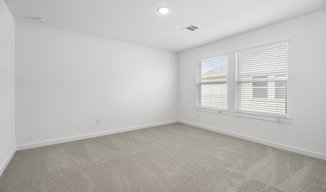 902 Hooks Trl, League City, TX 77573 - spare room with carpet floors, recessed lighting, and a smoke detector