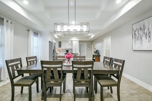 910 11th St, South Houston, TX 77587 - dining space with a raised ceiling, recessed lighting, and light tile patterned flooring