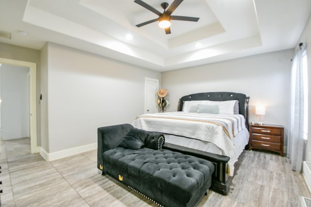 910 11th St, South Houston, TX 77587 - bedroom featuring a raised ceiling, ceiling fan, and recessed lighting