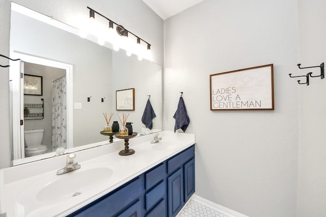 3214 Oak Park Ln, Missouri City, TX 77459 - bathroom featuring double vanity and tile patterned flooring