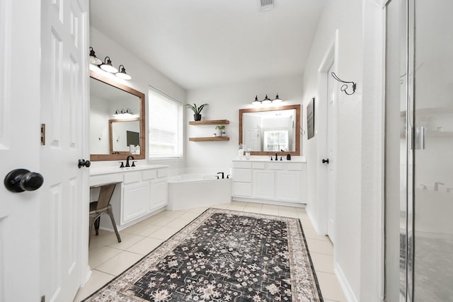 3214 Oak Park Ln, Missouri City, TX 77459 - bathroom featuring tile patterned flooring, a garden tub, two vanities, and a shower stall