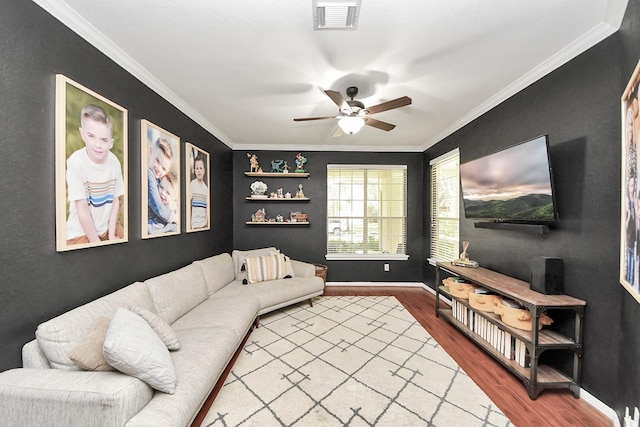 3214 Oak Park Ln, Missouri City, TX 77459 - living area with ceiling fan, wood finished floors, and crown molding
