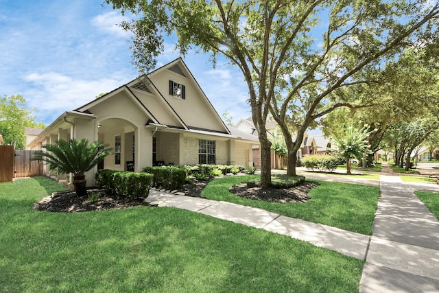 3214 Oak Park Ln, Missouri City, TX 77459 - view of front of house with stucco siding and stone siding