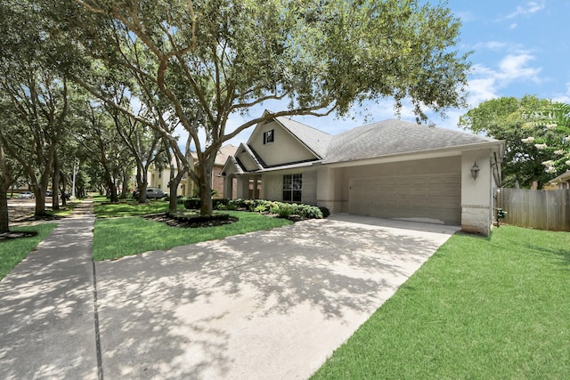 3214 Oak Park Ln, Missouri City, TX 77459 - view of front facade with an attached garage, concrete driveway, stucco siding, and a shingled roof
