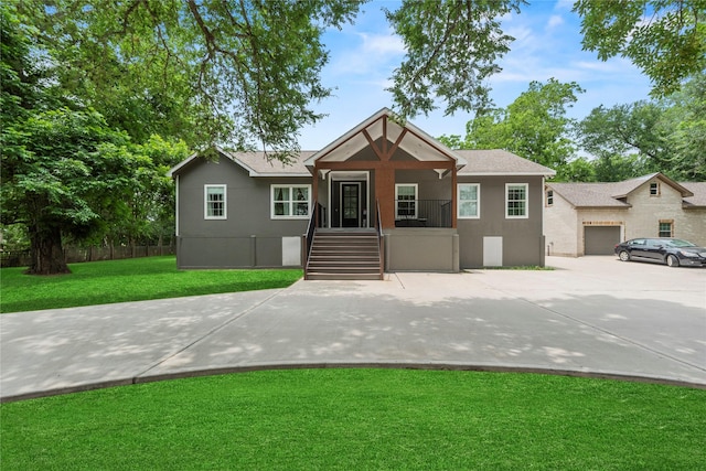 1415 Pony Ln, Simonton, TX 77485 - single story home featuring stucco siding, a front yard, concrete driveway, and a shingled roof