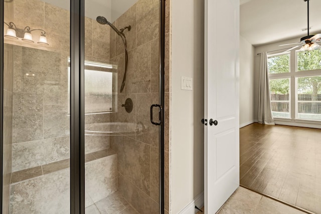 1719 Quail Ridge Dr, Katy, TX 77493 - bathroom with a ceiling fan and a stall shower