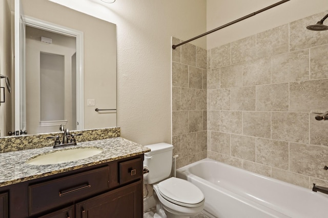 1719 Quail Ridge Dr, Katy, TX 77493 - bathroom with vanity, shower / washtub combination, and a textured wall