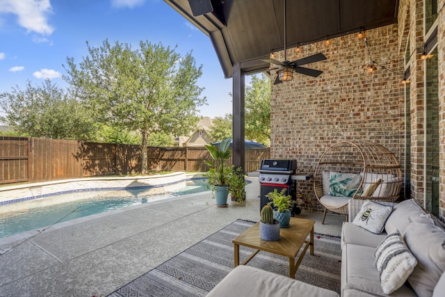 1719 Quail Ridge Dr, Katy, TX 77493 - fenced backyard with an outdoor hangout area, a patio area, a ceiling fan, and a grill