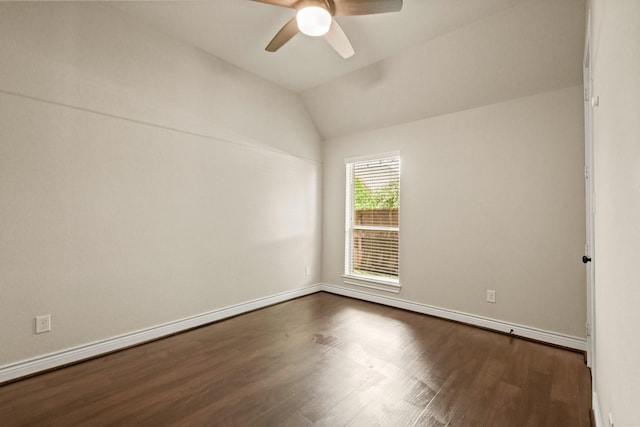 1719 Quail Ridge Dr, Katy, TX 77493 - spare room with dark wood finished floors, a ceiling fan, and vaulted ceiling