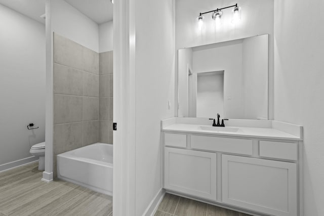2806 Nova Beach Dr, Texas City, TX 77568 - bathroom featuring vanity, wood finished floors, and  shower combination
