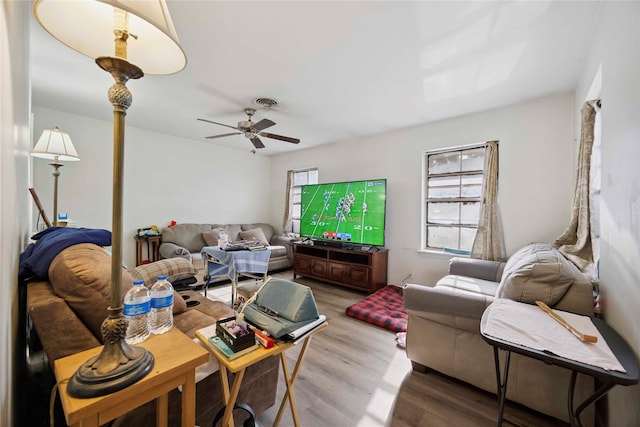 10926 Ivyridge Rd, Houston, TX 77043 - living room featuring plenty of natural light, wood finished floors, and a ceiling fan