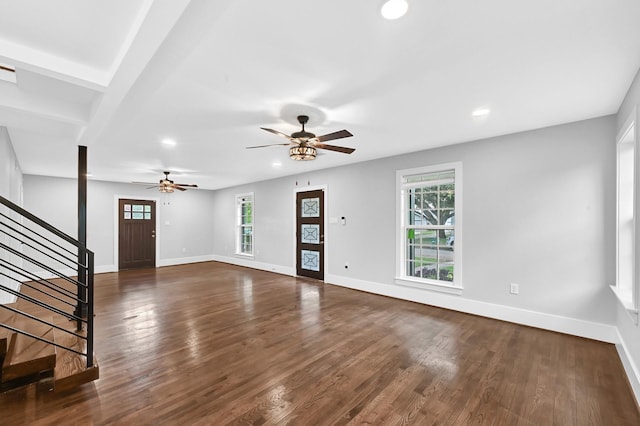 3343 Tampa St, Houston, TX 77021 - unfurnished living room with ceiling fan, recessed lighting, stairs, dark wood-style flooring, and beamed ceiling