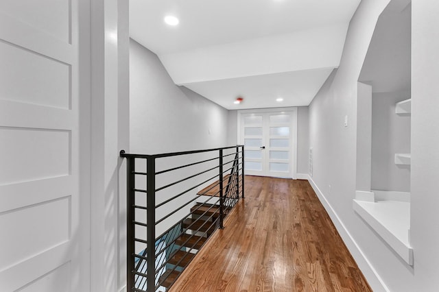3343 Tampa St, Houston, TX 77021 - corridor featuring an upstairs landing, wood finished floors, recessed lighting, and lofted ceiling
