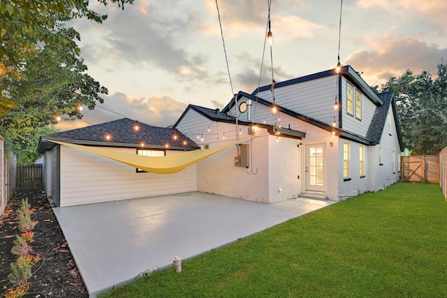 3343 Tampa St, Houston, TX 77021 - view of front of property with a fenced backyard, a patio, and brick siding