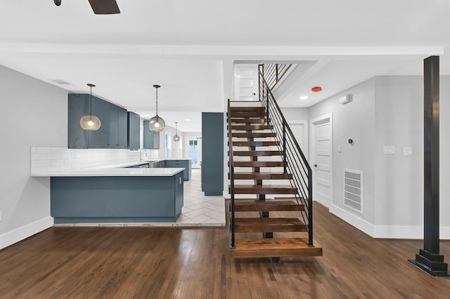 3343 Tampa St, Houston, TX 77021 - staircase with wood finished floors, recessed lighting, and a ceiling fan
