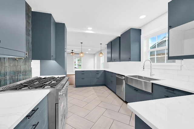 3343 Tampa St, Houston, TX 77021 - kitchen featuring range, dishwasher, backsplash, recessed lighting, and a peninsula