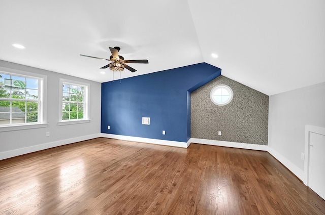 3343 Tampa St, Houston, TX 77021 - additional living space featuring ceiling fan, lofted ceiling, wood finished floors, an accent wall, and recessed lighting