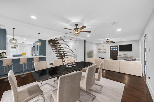 3343 Tampa St, Houston, TX 77021 - dining space with wood finished floors, ceiling fan, recessed lighting, and stairs