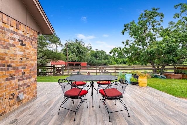 4205 Wade Rd, Brookshire, TX 77423 - deck featuring outdoor dining space and view of wooded area