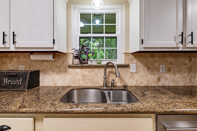 4205 Wade Rd, Brookshire, TX 77423 - kitchen featuring white cabinetry, dark stone counters, backsplash, and dishwasher