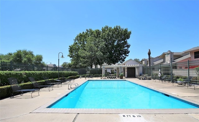 13002 Leader Unit 906, Houston, TX 77072 - community pool featuring a patio