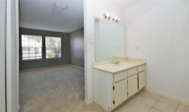 13002 Leader Unit 906, Houston, TX 77072 - bathroom with vanity and a textured ceiling