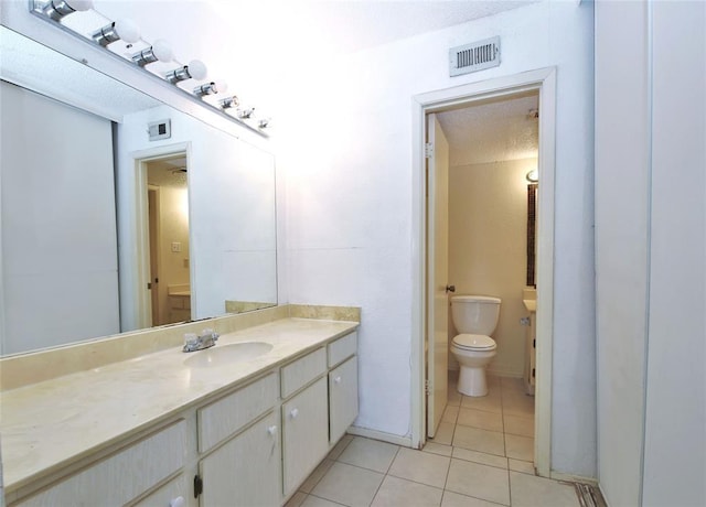 13002 Leader Unit 906, Houston, TX 77072 - bathroom with vanity and tile patterned flooring