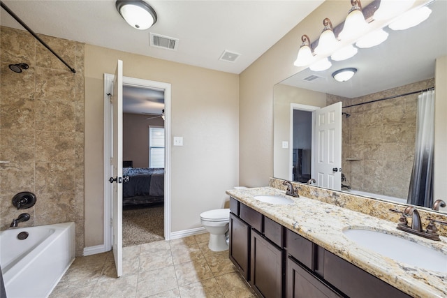 8234 Nagy Hill St, Spring, TX 77379 - ensuite bathroom with double vanity, shower / bath combo with shower curtain, tile patterned floors, and ceiling fan