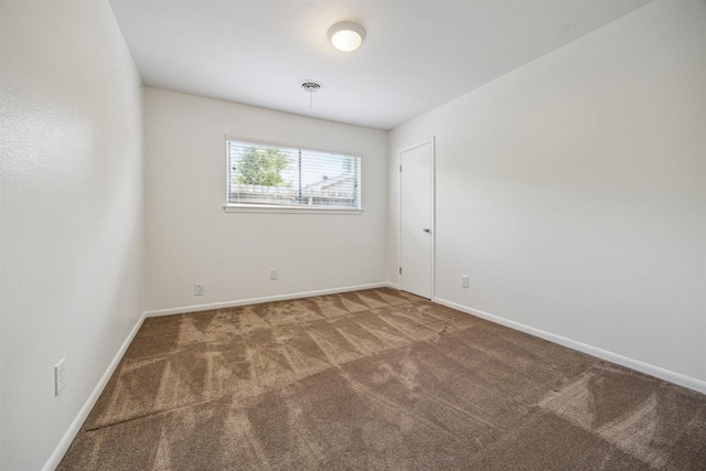 7539 Jason St, Houston, TX 77074 - carpeted empty room featuring baseboards