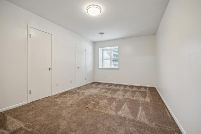 7539 Jason St, Houston, TX 77074 - unfurnished bedroom with carpet flooring and baseboards