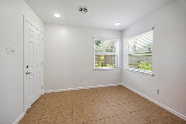 7539 Jason St, Houston, TX 77074 - spare room featuring baseboards and recessed lighting