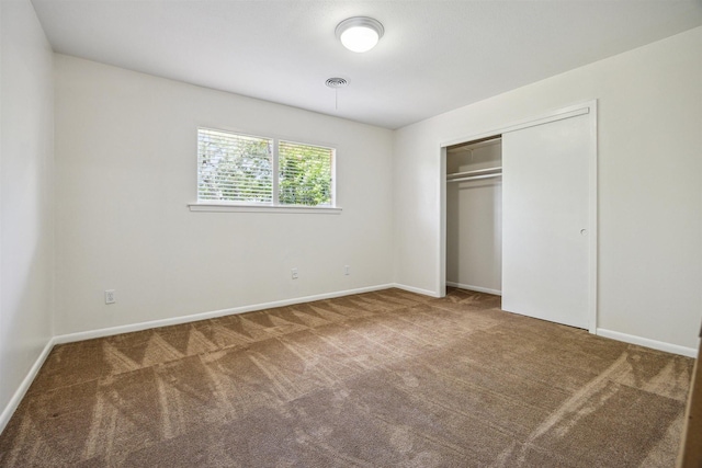 7539 Jason St, Houston, TX 77074 - unfurnished bedroom with carpet floors and a closet
