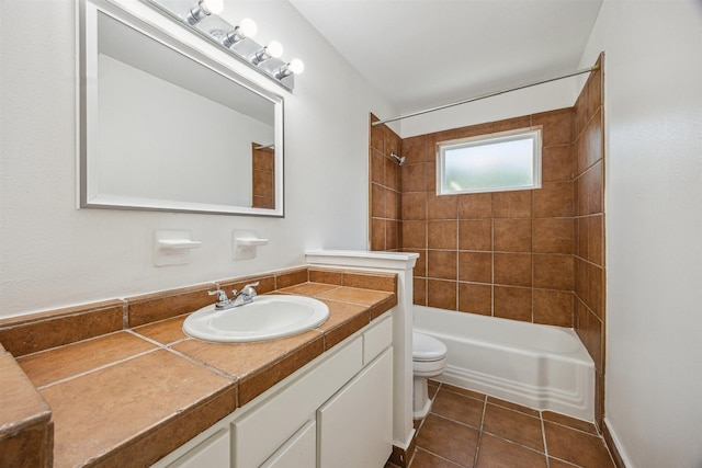 7539 Jason St, Houston, TX 77074 - full bath with vanity, tile patterned floors, and shower / tub combination