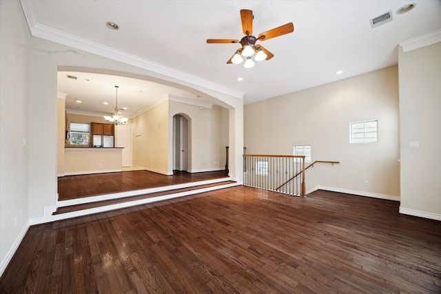 9007 Harbor Hills Dr, Houston, TX 77054 - spare room featuring arched walkways, a chandelier, ceiling fan, dark wood finished floors, and ornamental molding