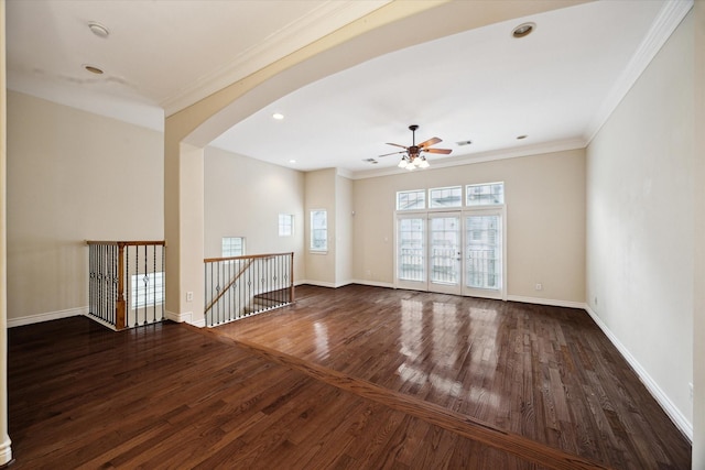 9007 Harbor Hills Dr, Houston, TX 77054 - spare room featuring ornamental molding, a ceiling fan, wood finished floors, arched walkways, and a smoke detector