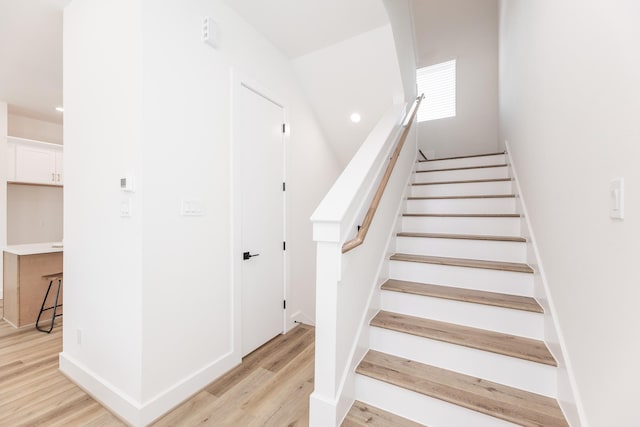 1615 Erin St, Houston, TX 77009 - staircase featuring wood finished floors and baseboards