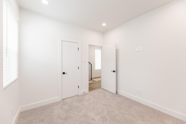 1615 Erin St, Houston, TX 77009 - unfurnished bedroom with carpet and recessed lighting