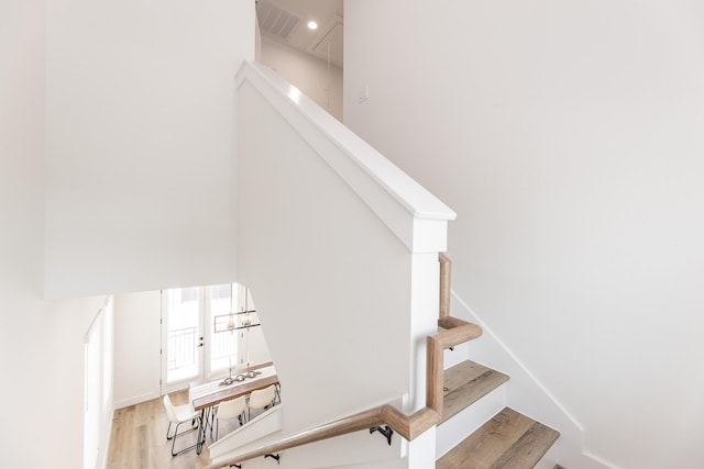 1615 Erin St, Houston, TX 77009 - staircase with wood finished floors