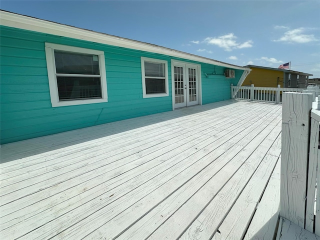 323 Texas St, Freeport, TX 77541 - wooden terrace with french doors