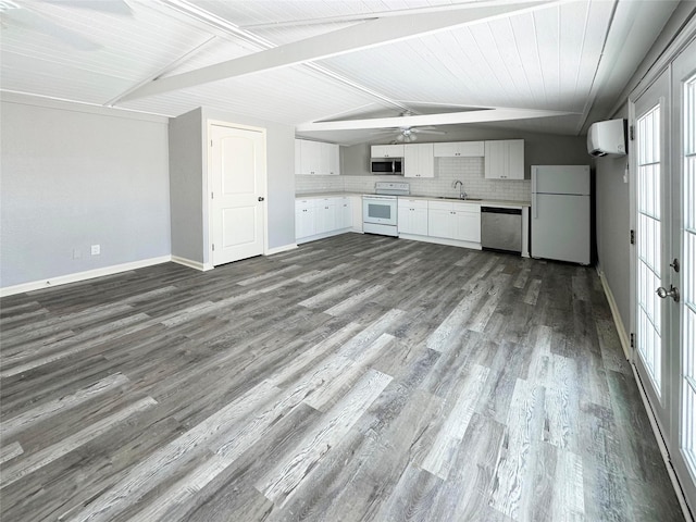 323 Texas St, Freeport, TX 77541 - unfurnished living room with ceiling fan, dark wood-style flooring, a wall mounted air conditioner, and wood ceiling