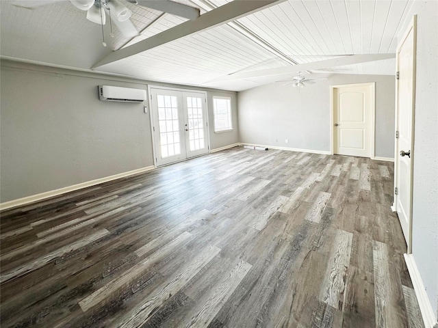 323 Texas St, Freeport, TX 77541 - unfurnished room featuring a ceiling fan, an AC wall unit, french doors, and wood finished floors