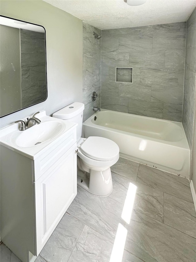 323 Texas St, Freeport, TX 77541 - full bathroom with vanity, shower / tub combination, and a textured ceiling