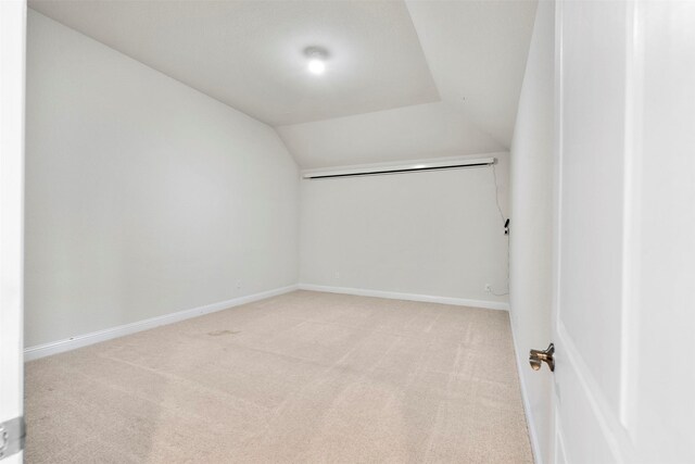 6126 Garden Lakes Ln, Sugar Land, TX 77479 - spacious closet featuring vaulted ceiling and carpet floors