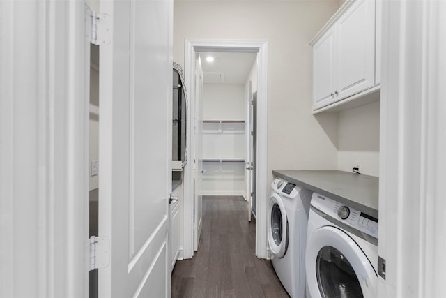6126 Garden Lakes Ln, Sugar Land, TX 77479 - laundry area featuring washing machine and clothes dryer, cabinet space, and dark wood finished floors