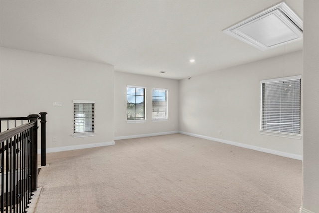 6126 Garden Lakes Ln, Sugar Land, TX 77479 - empty room featuring attic access, light colored carpet, and recessed lighting