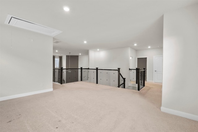 6126 Garden Lakes Ln, Sugar Land, TX 77479 - spare room with attic access, carpet flooring, and recessed lighting