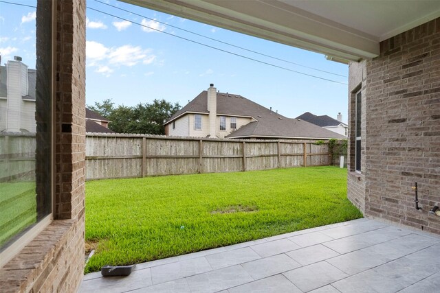 6126 Garden Lakes Ln, Sugar Land, TX 77479 - fenced backyard featuring a patio area