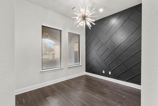 6126 Garden Lakes Ln, Sugar Land, TX 77479 - unfurnished room with a chandelier, wood finished floors, and recessed lighting