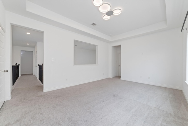 13731 Pedernales Ct, Cypress, TX 77429 - unfurnished room featuring a raised ceiling, light carpet, and recessed lighting